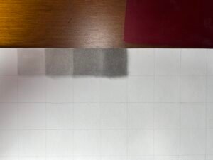 Graphite value scale on white drawing paper