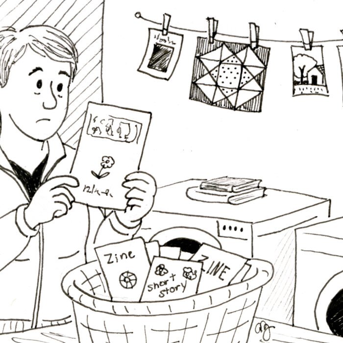 A black-and-white illustration of a woman standing in a laundry room, holding up a zine with a thoughtful expression as if examining a shirt. A laundry basket in front of her is filled with zines, short stories, and creative papers. Behind her, more artwork and small illustrations hang from a clothesline above a washing machine and dryer.