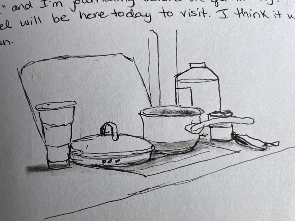Pen sketch of a small pot, lid, drinking cup, water container, and utensils arranged on a trailer counter.