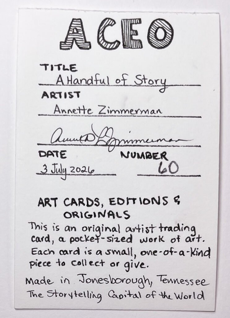 The handwritten back of an ACEO titled A Handful of Story, with the artist’s name, signature, date, number, and information about original artist trading cards.