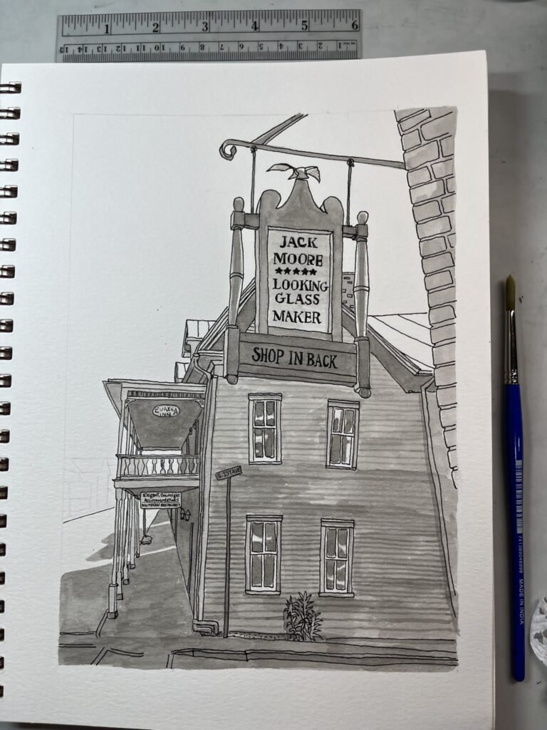 Monochrome ink-and-wash study of Jack Moore’s Looking Glass Maker sign above the Eureka Inn, with a ruler showing the artwork’s scale.